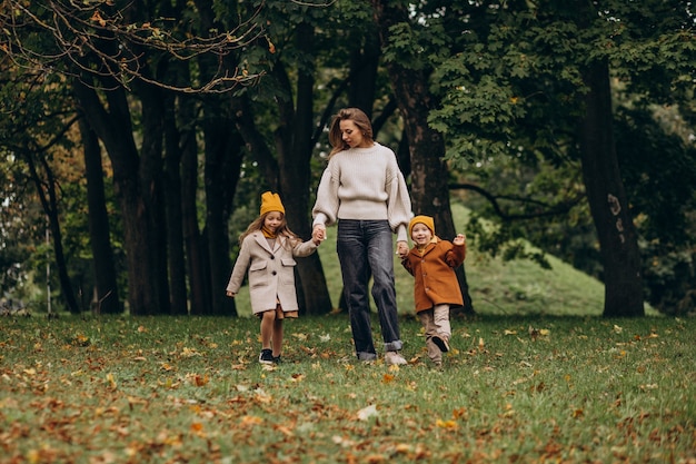 Mother with kids having fun in park