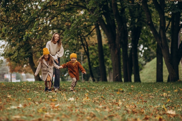 Mother with kids having fun in park