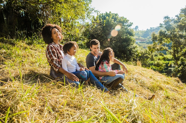 Free Photo mother with kids on a hill