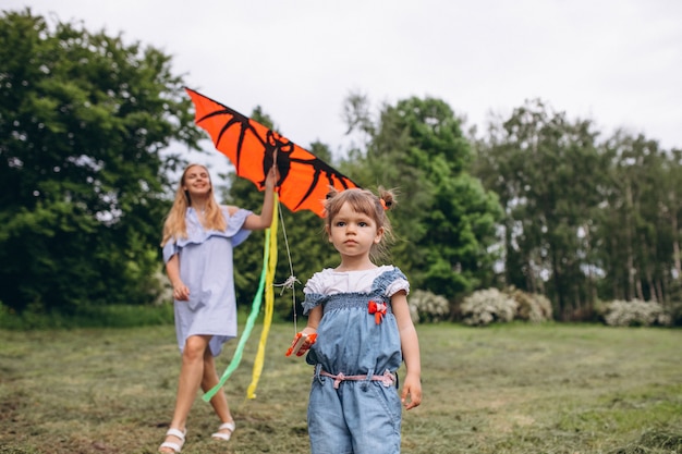 Mother with little daughter in park