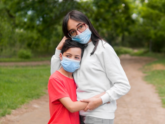 Mother with reading glasses and son