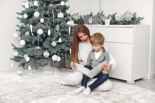 Mother with son in a Christmass decorations