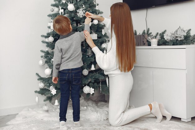 Mother with son in a Christmass decorations