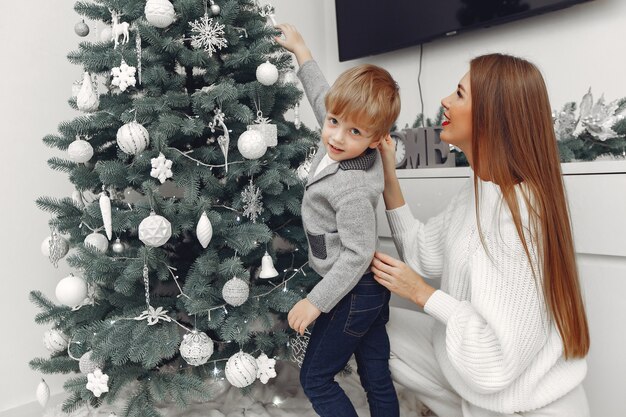 Mother with son in a Christmass decorations