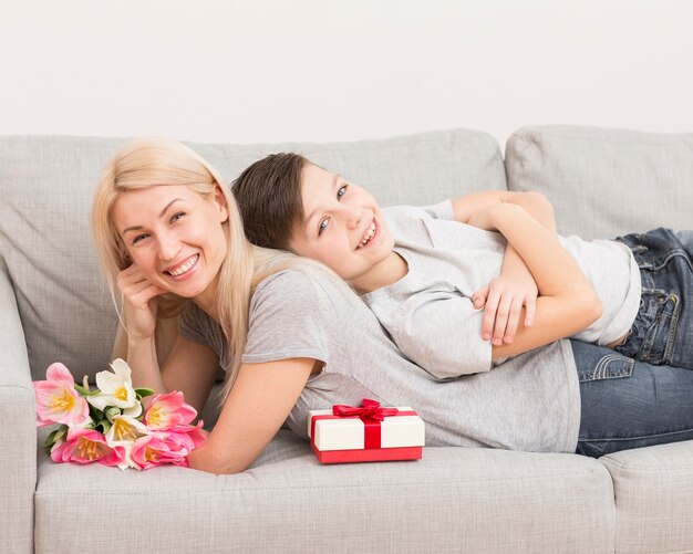 Mother with son on couch