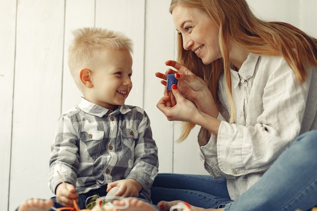 Mother with son preparing to easter at home