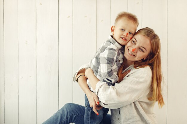 Mother with son preparing to easter at home