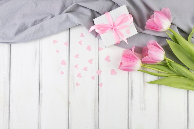Mothers day background with flowers and present