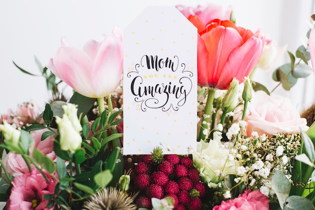 Mothers day background with tag on flowers
