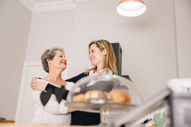 Free photo mothers day concept in kitchen