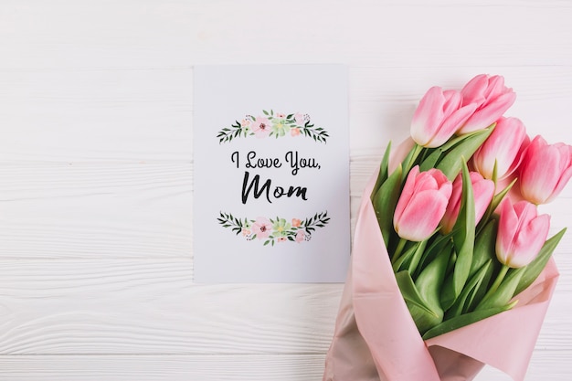 Mothers day concept with bouquet and card