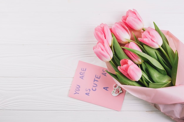 Mothers day concept with roses and card