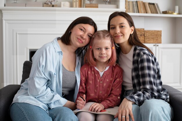 Mothers spending time together with their daughter