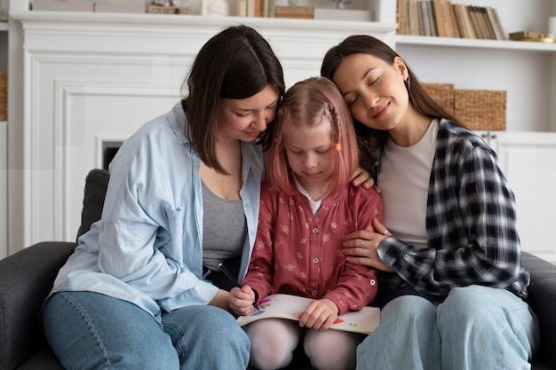 Mothers spending time together with their daughter