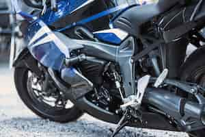 Free photo motorcycle luxury items close-up: headlights, shock absorber, wheel, wing, toning.