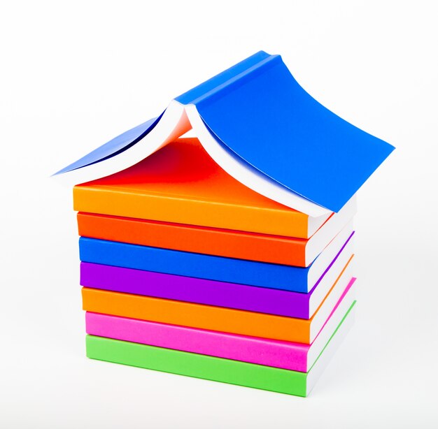 Mountain of books with white background