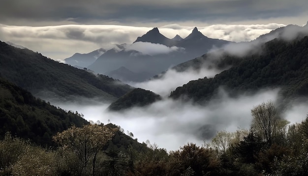 Free photo a mountain landscape with clouds and fog in the foreground