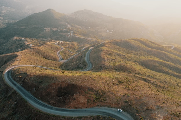 Mountain path road on panoramic landscape