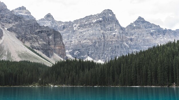 Mountain ranges near body of water during daytime