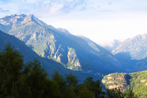 Mountains peaks with snow in summer