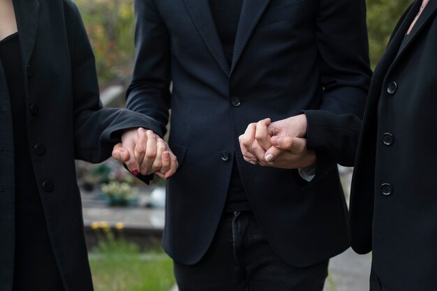 Mourning family together at the cemetery