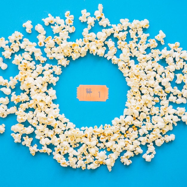 Free photo movie ticket and circular popcorn