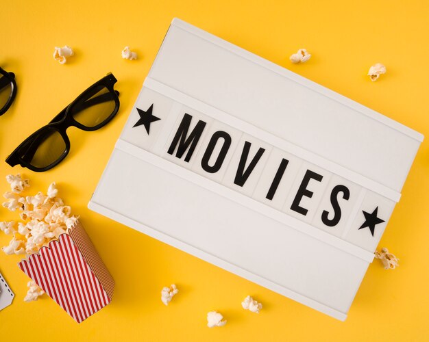 Movies lettering on yellow background