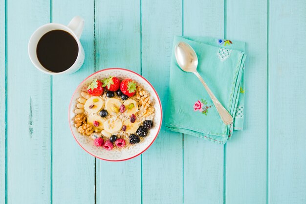 Muesli, coffee and spoon