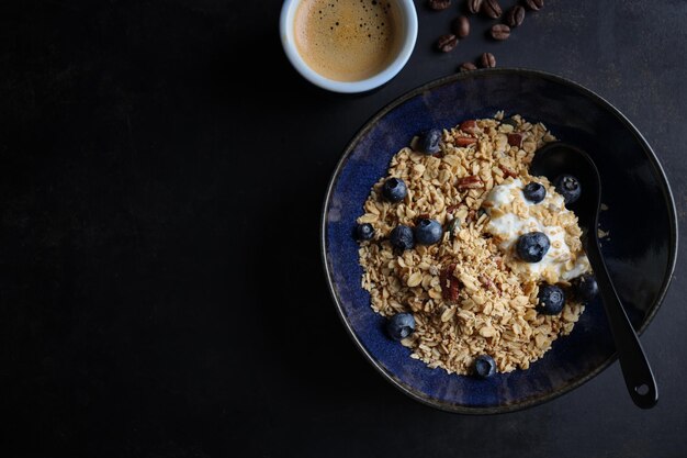 Muesli with fruits served in bowl