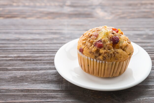 Muffin on wooden table