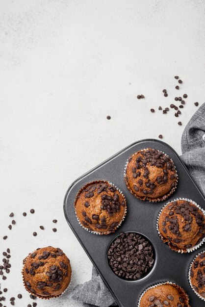 Muffins on baking tray with copy space