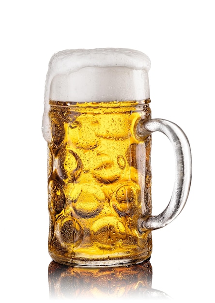 Mug with beer on white background. Beautiful foam and drops of moisture on a glass