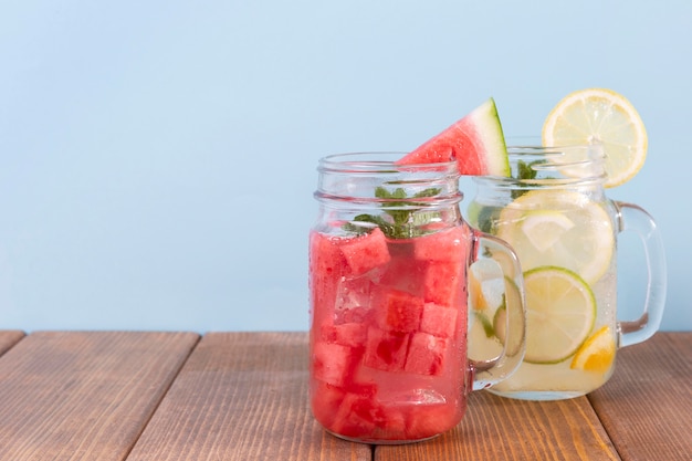 Mug with watermelon and lemon drinks