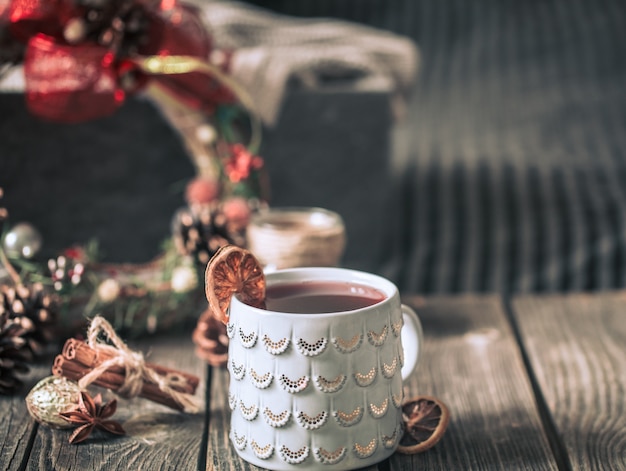 mulled wine in a cup on a wooden table