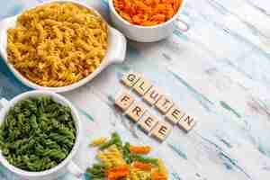 Free photo multi-colored gluten free vegetable fusilli pasta.