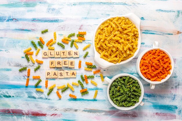 Multi-colored gluten free vegetable fusilli pasta.