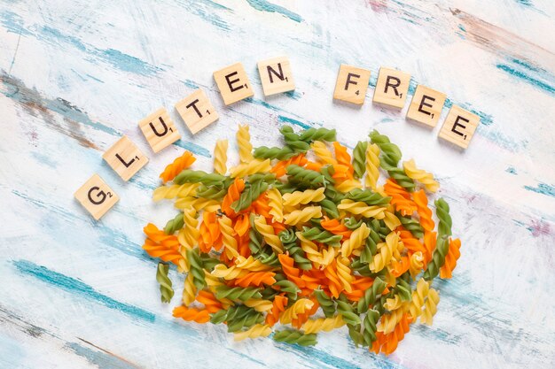 Multi-colored gluten free vegetable fusilli pasta.