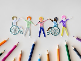 Multi-ethnic and disabled people community with pencils