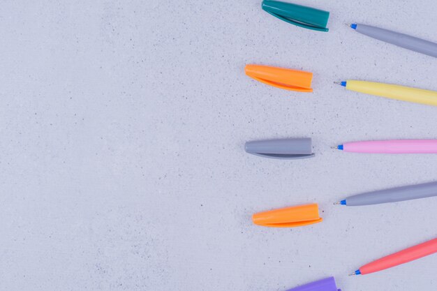 Multicolor pens for mandala isolated on grey surface