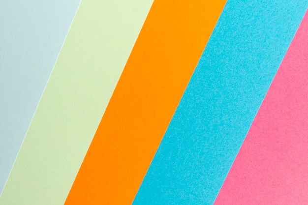 Multicolored aligned paper sheets background