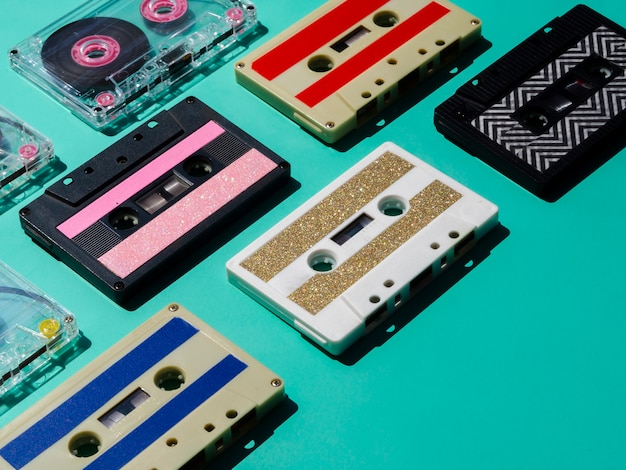 Multicolored cassette tapes collection in spotlight