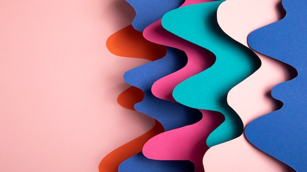 Free photo multicolored psychedelic paper shapes