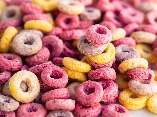 Multicoloured cereals with fruity close-up