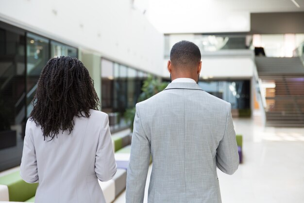 Multiethnic business colleagues on their way to office