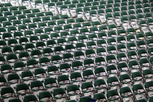 multiple chairs arranged in a row