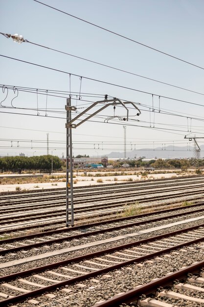 Multiple railways tracks in a sunny day