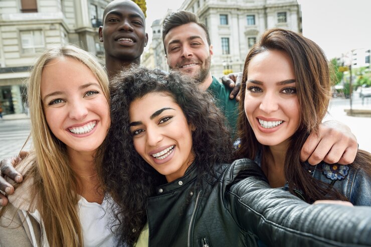 Free Photo multiracial group of young people taking selfie