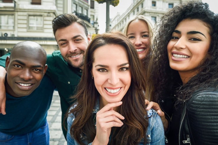 Free Photo multiracial group of young people taking selfie