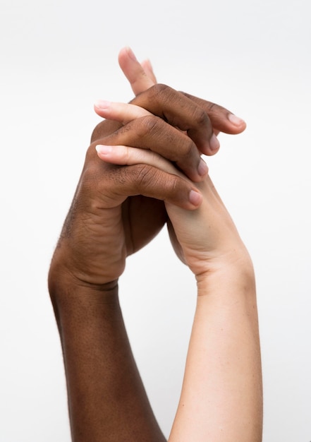 Free Photo multiracial hands coming together