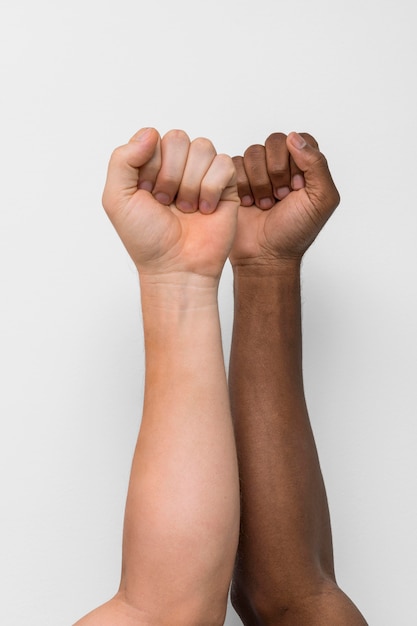 Free photo multiracial hands coming together